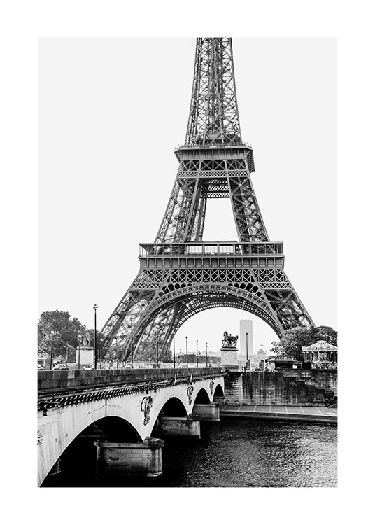 – Czarno–biały plakat przedstawiający wieżę Eiffla